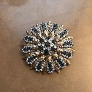 Light and dark blue rhinestone brooch.